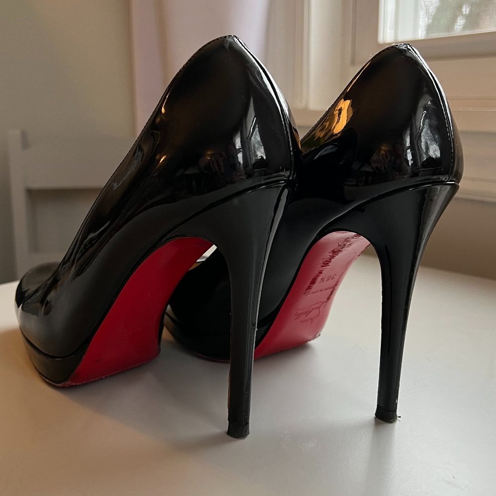 Christian Louboutin Black Patent pumps